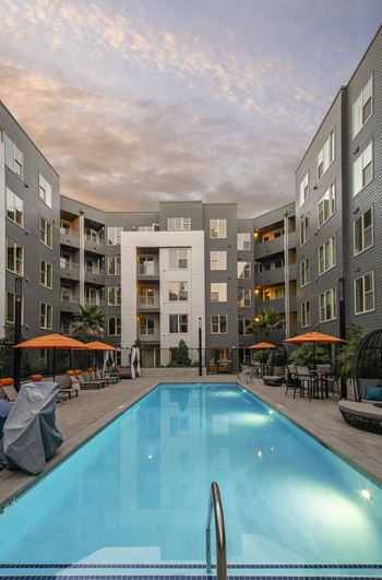 Relaxing resort-style pool with sundeck and spa